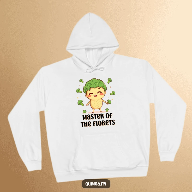 Funny Quinoa Juggling Hoodie: A curious quinoa character grinning while juggling small broccoli florets, perfect for cozying up.