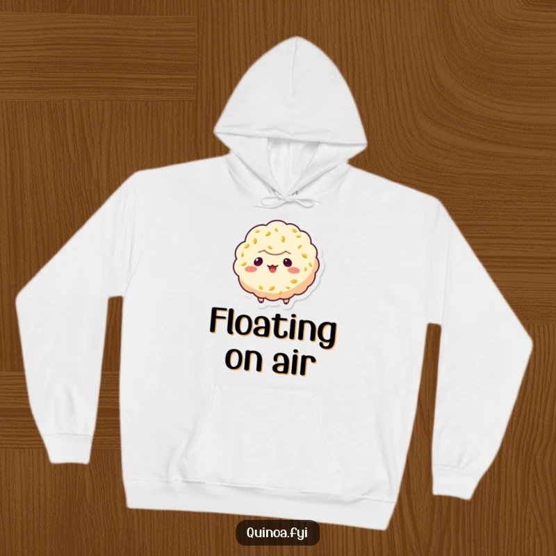 Funny quinoa puff character hoodie, floating with a mischievous grin, offering warmth and a touch of playful mischief.