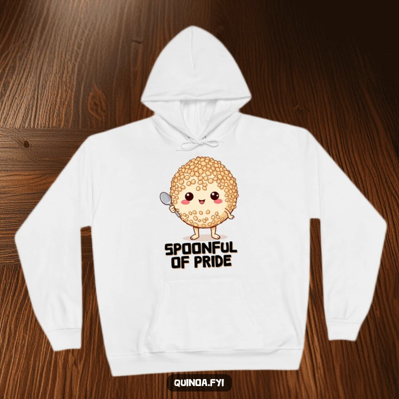 Funny hoodie showing a plump, proud quinoa character holding a tiny spoon, radiating confidence and warmth for chefs.