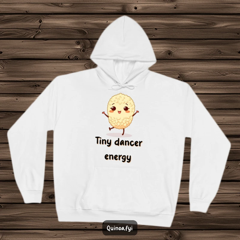 Funny hoodie art of a joyful quinoa grain with legs performing a little jig, radiating warmth and fun.